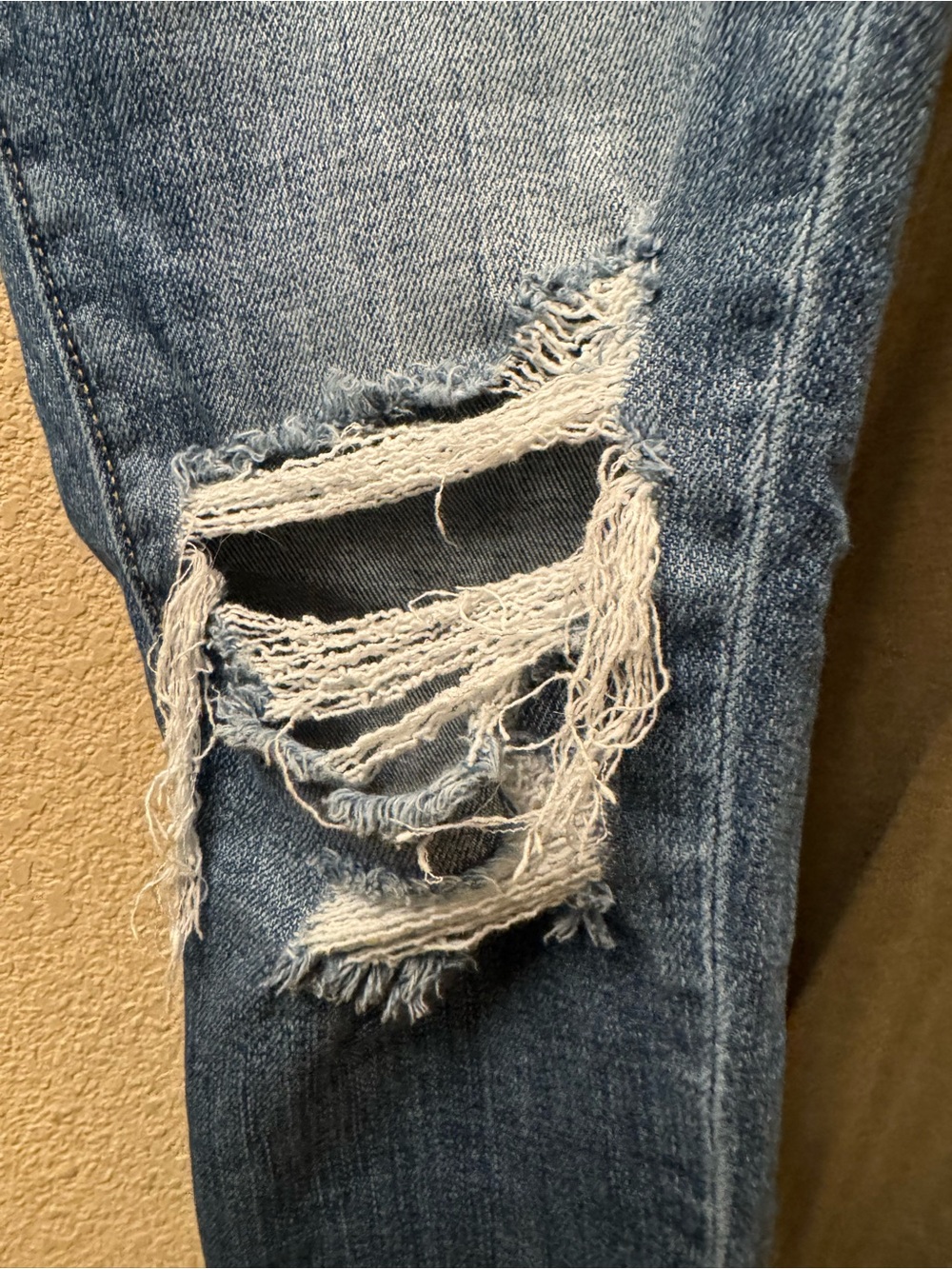 Buckle Light Blue Ripped Skinny Jeans